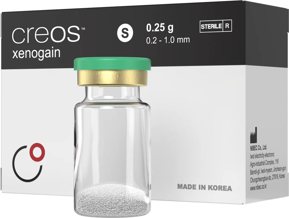 Flacon și ambalaj creos™ xenogain, material pentru adiție osoasă de la Nobel Biocare